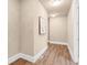 Hallway with hardwood floors and neutral paint at 3 Woodlawn Ne Dr, Marietta, GA 30067