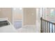 Hallway features a view of a sink and an adjacent carpeted bedroom at 3 Woodlawn Ne Dr, Marietta, GA 30067