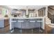 Spacious kitchen with a large marble island, stainless steel appliances and modern design at 3 Woodlawn Ne Dr, Marietta, GA 30067