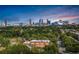 Scenic aerial view of the city skyline, showcasing the surrounding lush green landscape at 1008 Lena Nw St, Atlanta, GA 30314