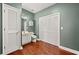 Well-lit bathroom with ample storage, vanity, and closet, offering both functionality and style at 1008 Lena Nw St, Atlanta, GA 30314