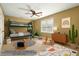 bedroom staged with bunkbeds, neutral carpet and colorful rug, bright and inviting with virtual enhancements at 1008 Lena Nw St, Atlanta, GA 30314