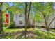 Charming home featuring a well-kept lawn, mature trees, and inviting curb appeal at 1008 Lena Nw St, Atlanta, GA 30314