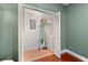A laundry closet with built-in shelving, a washer, and a well-organized space at 1008 Lena Nw St, Atlanta, GA 30314