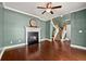 Spacious living room with hardwood floors, fireplace, and staircase at 1008 Lena Nw St, Atlanta, GA 30314
