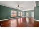 Large living room featuring gleaming hardwood floors and natural light at 1008 Lena Nw St, Atlanta, GA 30314