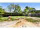 Large backyard featuring a storage shed, fenced perimeter, and open space for various outdoor activities at 3556 Finch Sw Rd, Powder Springs, GA 30127