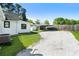 View of the backyard featuring a shed and carport at 3556 Finch Sw Rd, Powder Springs, GA 30127
