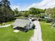 Charming home featuring a spacious yard, covered porch, and a gravel driveway at 3556 Finch Sw Rd, Powder Springs, GA 30127