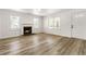 Cozy living room with fireplace, lots of natural light and fresh paint at 3556 Finch Sw Rd, Powder Springs, GA 30127