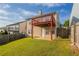 Fenced backyard featuring grass and a porch on the second level at 3721 Longview Dr, Douglasville, GA 30135