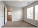 A bedroom featuring two closets and two windows at 3721 Longview Dr, Douglasville, GA 30135