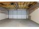 Spacious garage with shelves and automatic door at 3721 Longview Dr, Douglasville, GA 30135