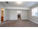 An open-concept living room with a bathroom and stairs visible at 3721 Longview Dr, Douglasville, GA 30135