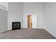 Living room featuring plush carpet and fireplace at 3721 Longview Dr, Douglasville, GA 30135