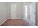 Bedroom featuring neutral walls, carpet flooring, with a door that leads to another room at 6895 Brown S Dr, Fairburn, GA 30213