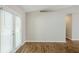 Bright living room with hardwood floors, French doors, and ample natural light at 6895 Brown S Dr, Fairburn, GA 30213