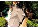 Aerial view of a home featuring a large backyard, pool, patio, and a well-maintained roof at 7635 Blandford Pl, Atlanta, GA 30350