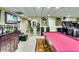 Finished basement with bar, pool table, game and entertainment area for relaxation and social gatherings at 7635 Blandford Pl, Atlanta, GA 30350