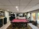 Finished basement offers ample space for recreation, including a pool table and entertainment area at 7635 Blandford Pl, Atlanta, GA 30350
