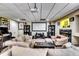 Finished basement media area with projector screen and comfortable seating perfect for movie nights at 7635 Blandford Pl, Atlanta, GA 30350