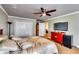 Bedroom with carpet flooring, ceiling fan, and closet space at 7635 Blandford Pl, Atlanta, GA 30350