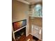 Bright foyer with chandelier, two-story ceiling, and arched window at 7635 Blandford Pl, Atlanta, GA 30350
