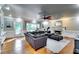 Inviting living room with a cozy fireplace, hardwood floors, and plenty of natural light at 7635 Blandford Pl, Atlanta, GA 30350