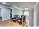 Sitting area on a loft with hardwood floors, chair seating, and recessed ceiling lights at 7635 Blandford Pl, Atlanta, GA 30350