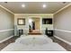 Luxurious bathroom with an extra large soaking tub, a sleek design, and stylish fixtures at 7635 Blandford Pl, Atlanta, GA 30350