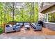 Relaxing outdoor living space with comfortable seating, perfect for enjoying the serene surroundings at 7635 Blandford Pl, Atlanta, GA 30350