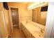 Bright bathroom with a double sink vanity and walk-in shower at 2977 Karen Ln, Marietta, GA 30062