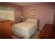 Bedroom showcases a single bed, neutral color scheme, and ample natural light at 2977 Karen Ln, Marietta, GA 30062