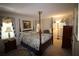 Spacious bedroom featuring a decorative four-poster bed and floral accents at 2977 Karen Ln, Marietta, GA 30062