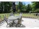 Outdoor deck featuring patio furniture and a peaceful backyard view at 2977 Karen Ln, Marietta, GA 30062
