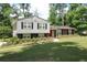 Charming two-story home with black shutters and a landscaped yard at 2977 Karen Ln, Marietta, GA 30062