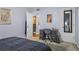 Comfortable bedroom featuring an accent rug and a dark-colored desk area at 1445 Monroe Ne Dr # E25, Atlanta, GA 30324