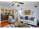 Open floor plan with a living room and bar with stainless steel appliances at 1445 Monroe Ne Dr # E25, Atlanta, GA 30324