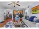 Open floor plan with a living room, dining area, and a breakfast bar at 1445 Monroe Ne Dr # E25, Atlanta, GA 30324