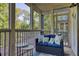 Inviting screened porch with comfortable seating and views of the lush greenery at 1445 Monroe Ne Dr # E25, Atlanta, GA 30324