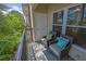 Relax on this private balcony with comfortable seating and enjoy the peaceful green views at 1850 Cotillion Dr # 3307, Atlanta, GA 30338