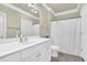 Well-maintained bathroom with neutral finishes, vanity, and combined shower and bathtub at 1850 Cotillion Dr # 3307, Atlanta, GA 30338