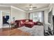 Relax in this spacious living room featuring a plush rug and a comfortable, oversized sofa at 1850 Cotillion Dr # 3307, Atlanta, GA 30338