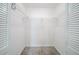 Walk-in closet with wire shelving and carpeted floor provides ample storage space at 210 Meadowbrook Dr, Mcdonough, GA 30253