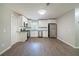 Updated kitchen with stainless steel appliances, and white cabinets at 210 Meadowbrook Dr, Mcdonough, GA 30253