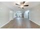 Open-concept view showcases luxury vinyl plank flooring and an updated kitchen with stainless appliances at 210 Meadowbrook Dr, Mcdonough, GA 30253