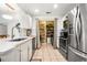 Modern kitchen features stainless steel appliances and granite countertops at 1101 Juniper Ne St # 1519, Atlanta, GA 30309
