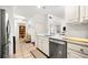 Galley kitchen features stainless steel appliances and granite countertops at 1101 Juniper Ne St # 1519, Atlanta, GA 30309