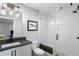 Bathroom featuring designer tile, a glass enclosed shower, modern vanity and lighting at 1331 Iverson Ne St # A, Atlanta, GA 30307