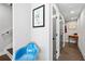 Hallway featuring hardwood floors, fresh paint, and a modern art print at 1331 Iverson Ne St # A, Atlanta, GA 30307
